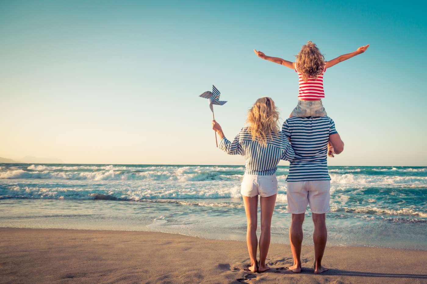 Man with family on vacation using employee leave