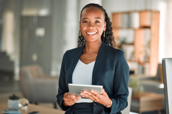 Business woman smiling after speaking with vendor management specialist