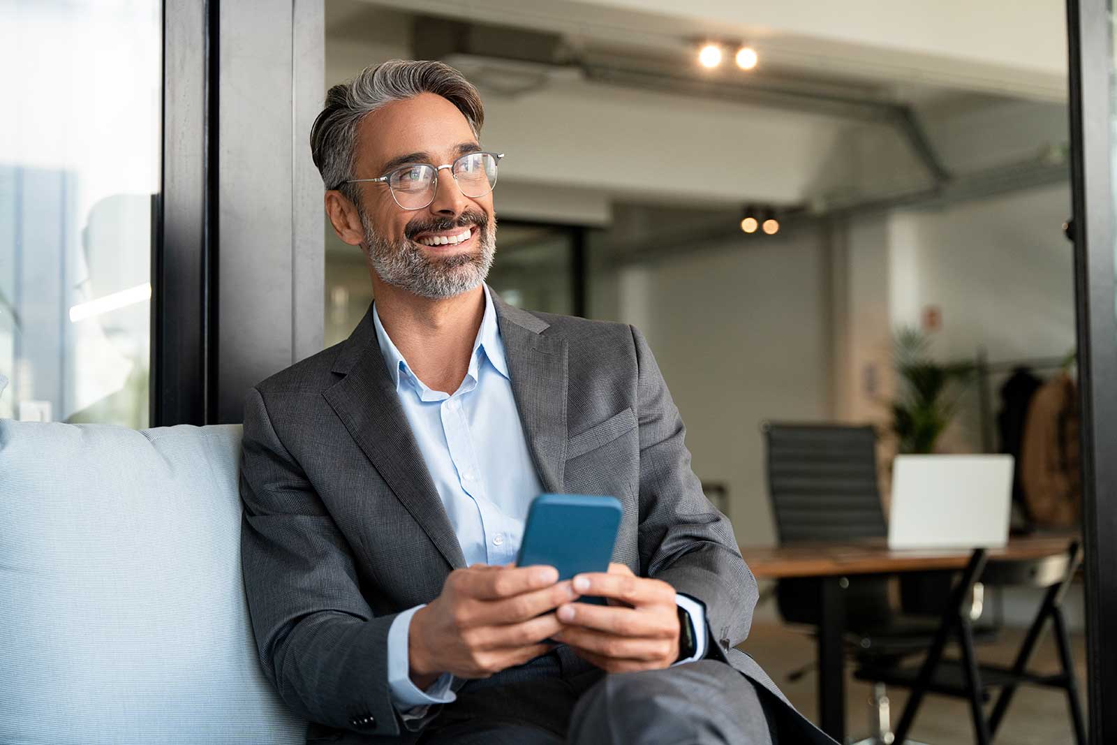 Gentleman smiling after scheduling a consultation for bookkeeping services