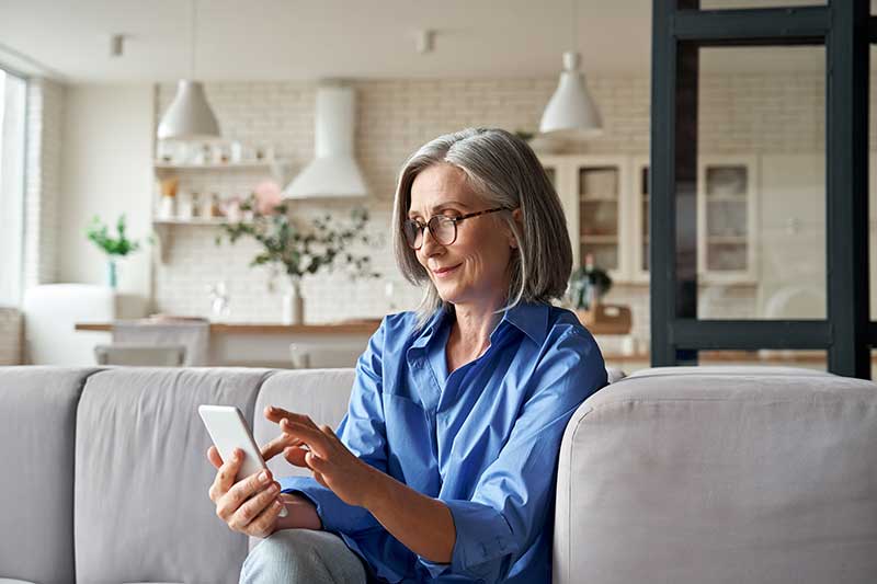 Woman on her phone requesting tax planning services