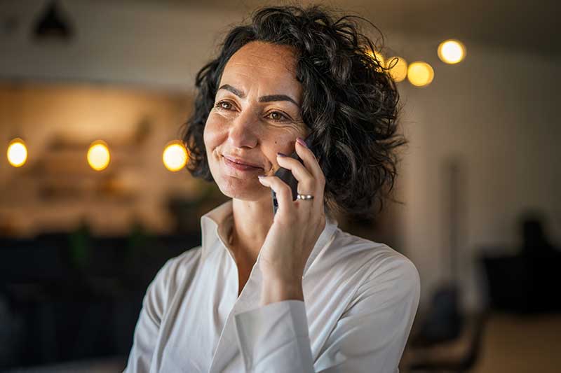 Woman on phone inquiring about investment management services