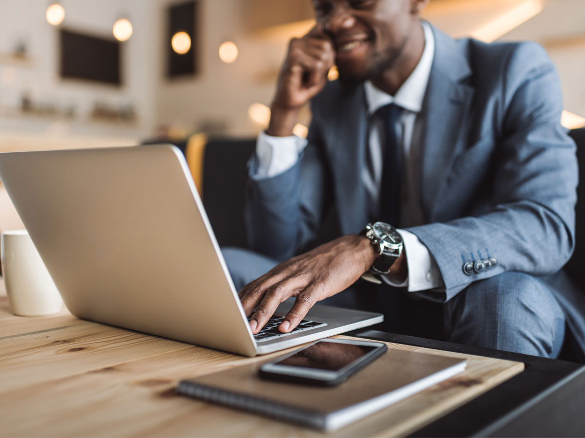 man working on computer in office